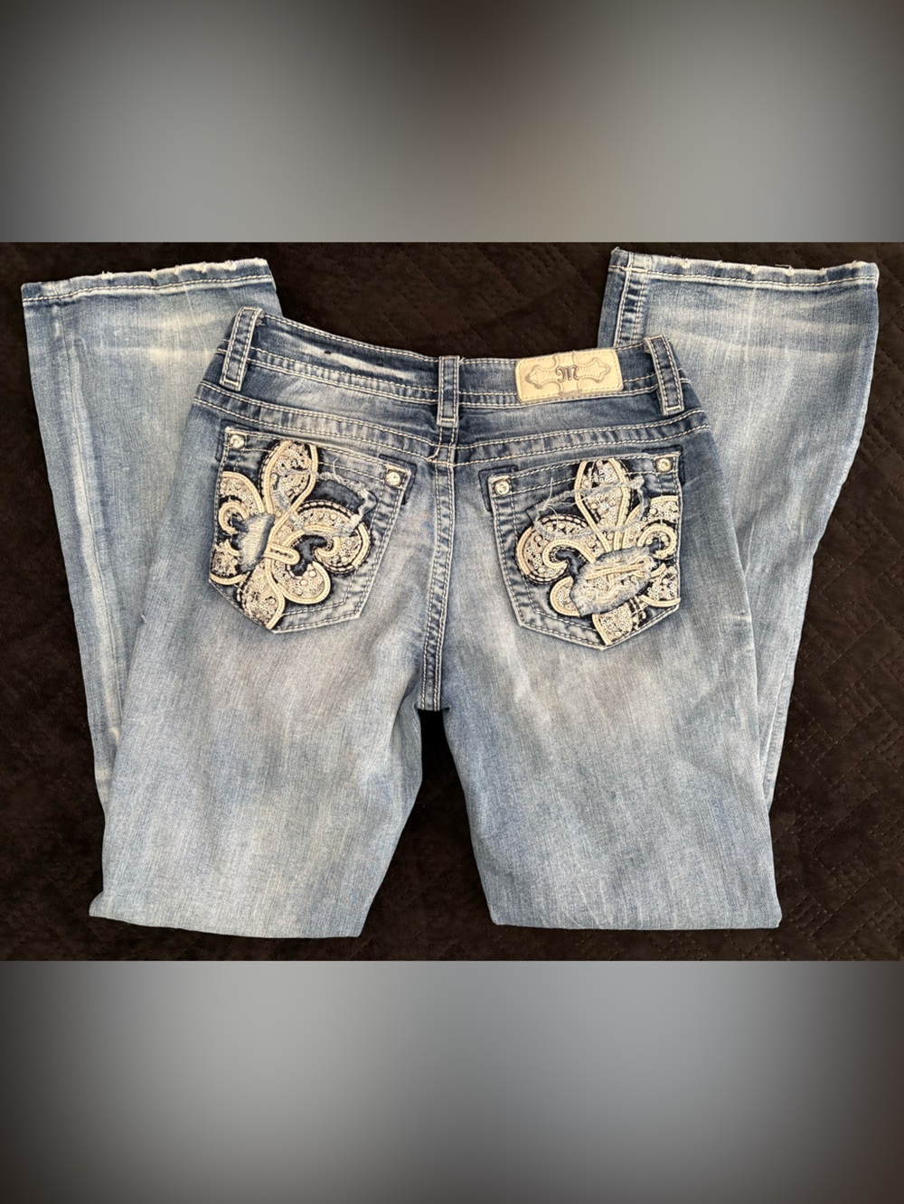 Miss Me low rise distressed boot cut jeans